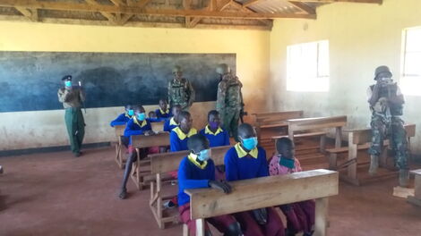 Armed officers deployed in classrooms on Monday, September 13.