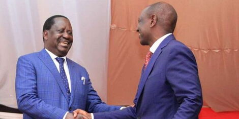 Azimio Chief Raila Odinga and President William Ruto shake hands at a apast event..jpg