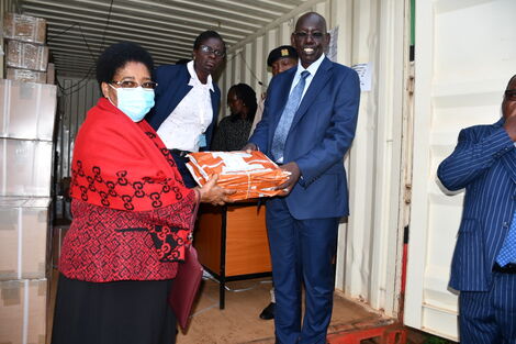 Basic Education PS Belio Kipsang after opening exam container at Westlands Sub County, Nairobi on December 5, 2022