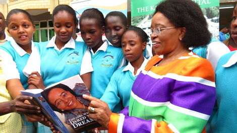 Outgoing Karen Hospital CEO Betty Gikonyo with school girls