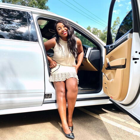 Betty Kyallo poses in her new Porsche Cayenne. June 2, 2020.