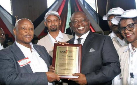 Billionaire Richard Ngatia (right) celebrates after being appointed as KNCCI President