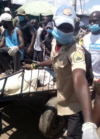 Residents accompany the body of Vitalis Owino to Muthaiga Police Station on May 4, 2020