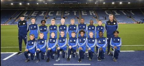 Brooklyn Mwadime Kazungu (Back row third from left) poses for a team photo at the King Power Stadium.