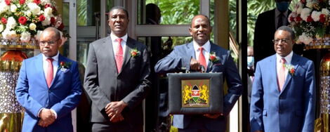 Treasury CS Ukur Yattani (with briefcase) poses for a photo with his docket's officials before reading the Budget 2020/21 in Parliament on Thursday, June 11, 2020