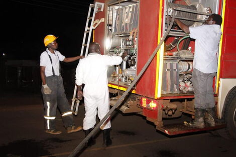 Bungoma County Government officials preparing to fumigate the town.
