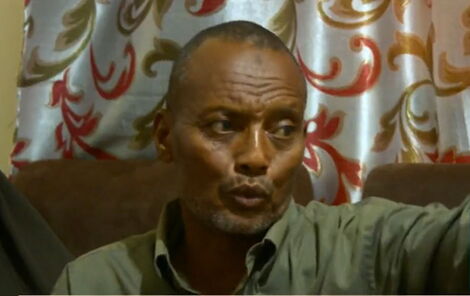 Businessman Mohammed Hassan's brother Omar Hassan Mohammed speaks to the press.