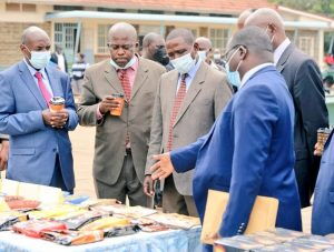 CAS agriculture Lawrence Omuhaka joined by dignitaries during the official opening of KU Coffee house.
