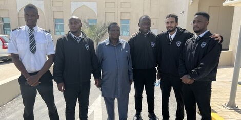 COTU Boss, Francis Atwoli (centre) and some of the Kenyan workers in Doha, Qatar on Saturday, February 19.