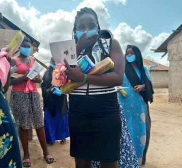 Milka and Red Cross teams receive donations from Hon. Mwanajuma Mabuke