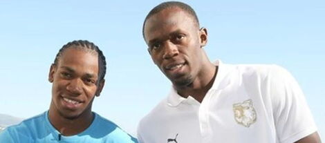 Jamaican sprinters Yohan Blake (left) and Usain Bolt