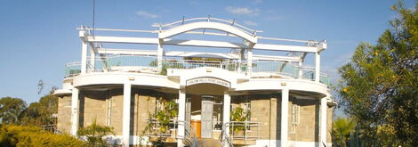 A side view of the Guesthouse inside Shallom Picnic Gardens.