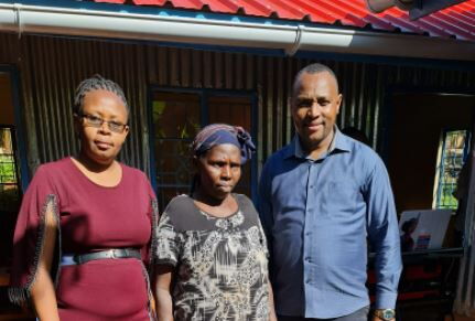 Kameme FM radio presenter, Muthee Kiengei (right) poses for a photo alongside Kang'ethe's mother (centre) on Wednesday, May 11 in Nyeri County. 