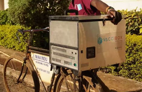 A local transporting VacciBox, Norah Marego's invention.