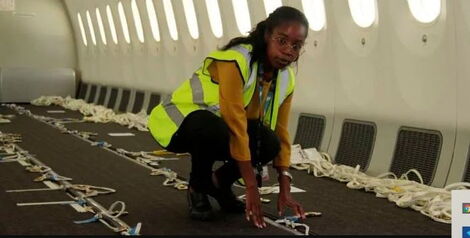 Kenya Airways development engineer Hazel Wachira in a repurposed aircraft for cargo in Nairobi on Thursday, February 25.
