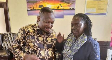 Former Nairobi governor Mike Sonko shares a light moment with Azimio la Umoja running mate, Martha Karua at Wilson Airport on Tuesday, July 12