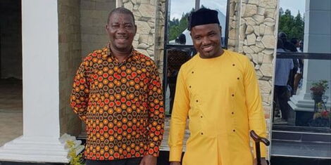 Former Chulaimbo High School principal Hezron Oyolla and Ken Carson during the housewarming in Kisumu County.