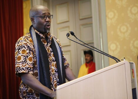 Cartoonist Godfrey Mwapemba (Gado) giving a speech.