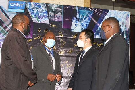 CHINT Global company Sales Manager for West Asia, Africa Thomas Shan (second from right) from left to right Tom Kimana, Engineer Nicholas Kiminda in charge of engineering at KPLC and Eric Abila from KPLC during the opening of the company