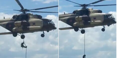 Photo collage of a military chopper stationary mid air with KDF choppers disembarking using a rope