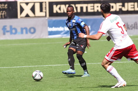 Christian Bwamy (left) during a past match featuring for Follo FK.