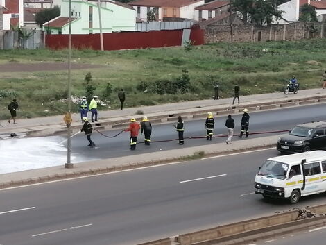 Firefighters involved in a clean up on Outering Road. Source: Facebook