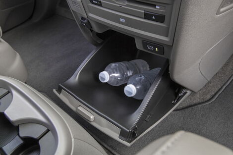 An image of an inbuilt car drink cooler.