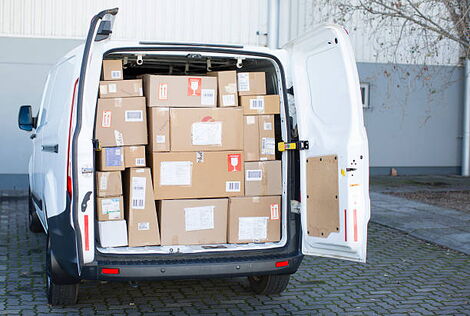 Courier van full of parcels and boxes