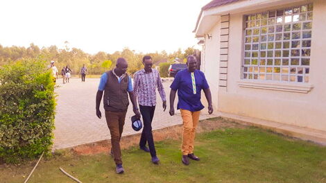 Kimilili MP Didmus Barasa with Deputy President William Ruto and an unidentified man on Friday, January 7, 2022.