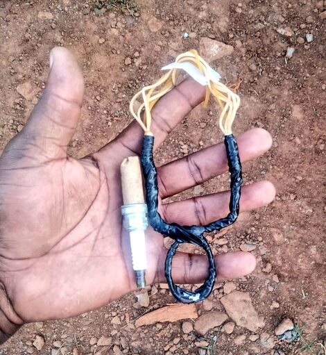 A catapult and spark plugs used to break into vehicles in a new scheme targeting Kenyans making bank withdrawals.