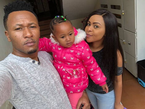 File image of DJ Mo and Size 8 with their child