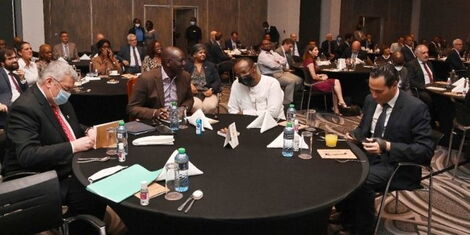 President William Ruto (second left) and David Ndii (centre) and members of the European Business Community at the Village Market on Tuesday, February 15.