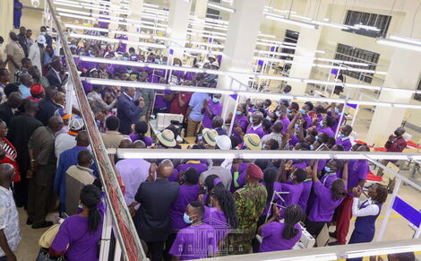 President Uhuru Kenyatta inside Dada Export Processing Zone Limited, a garment manufacturing factory in Kisumu opened on Tuesday August 2, 2022.
