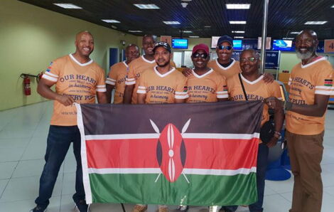 Photo of Dafton Mwitiki (Centre, smiling in black hat) with other members of the team that represented Kenya at the 2019 IDPA shooting tournament in South Africa