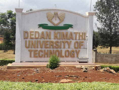 A road sign of Dedan Kimathi University of Technology.