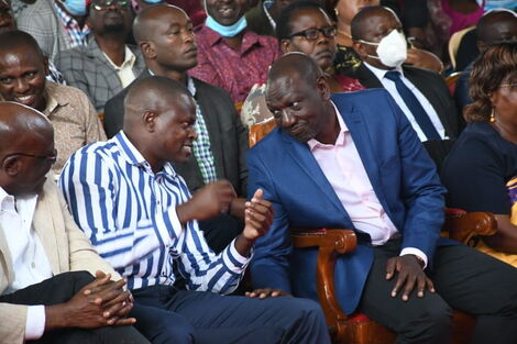 Deputy President William Ruto (right) speaks to Kiharu MP Ndindi Nyoro at AIPCA Church in Kenol on Sunday, October 4, 2020.