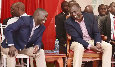 Deputy President William Ruto shares a light moment with the Nandi Governor Stephen Sang on March 13, 2020.