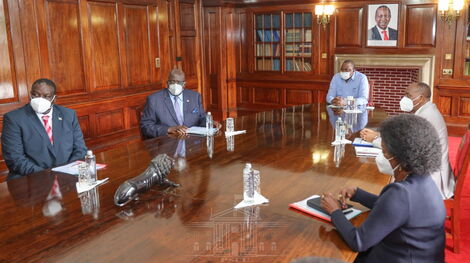 President Uhuru Kenyatta receives the 2020 KCSE results from the education ministry on Monday, May 10