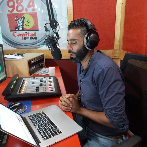 Capital FM presenter Fareed Khimani in studio