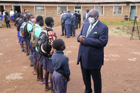 Education CS George Magoha conversing with 2020 KCPE Candidates.