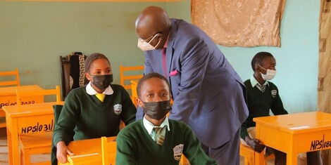 Education CS George Magoha with KCPE Candidates at the Moi Nyeri Complex Primary School on Tuesday, March 8, 2022.