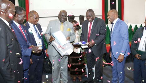 Former Education Cabinet Secretary Professor George Magoha (Centre) during the launch of NEMIS on August 22, 2022