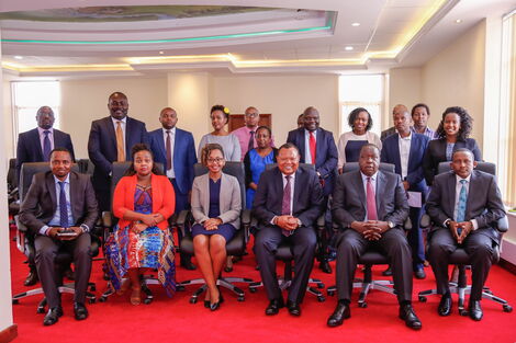 PDU Secretary Andrew Wakihiu and Interior CS Fred Matiang'i with other PDU staff at their new offices at Tourism Fund Building on September 23, 2020