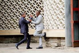 Embakasi East MP Babu Owino (left) greets his Starehe counterpart Charles 'Jaguar' Kanyi outside Parliament.