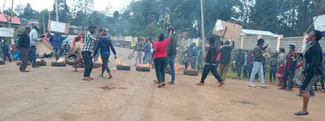 Embu resident light bonfires during a protest