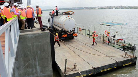 Engineers assess progress at the Kisumu Oil Jetty in February 2018.