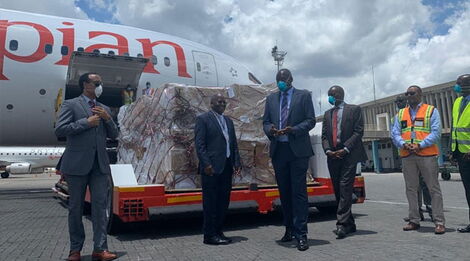 Ethiopia’s Ambassador to Kenya Meles Alem (left), KAA chief executive Alex Gitari (centre) and Kenya’s Director of Health Patrick Amoth receive a donation from Chinese billionaire and Alibaba co-founder Jack Ma at JKIA.