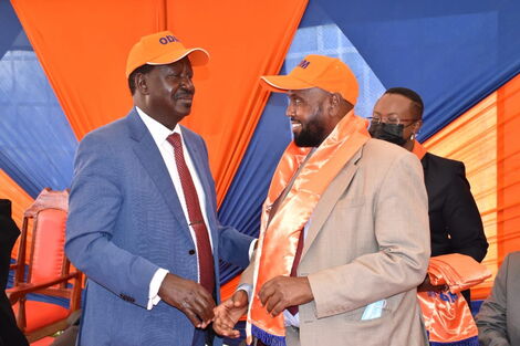 ODM party leader Raila Odinga together with Education Chief Administrative Secretary Noor Hassan at Chungwa house on November 30, 2021.