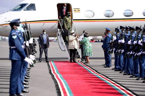 President Yoweri Museveni being received by Foreign Affairs CS Rachael Omamo at JKIA on April 8, 2020.
