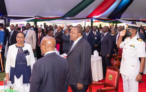 President Uhuru Kenyatta and Deputy President William Ruto seated at separate tables during the National Prayer Breakfast on May 26, 2022.